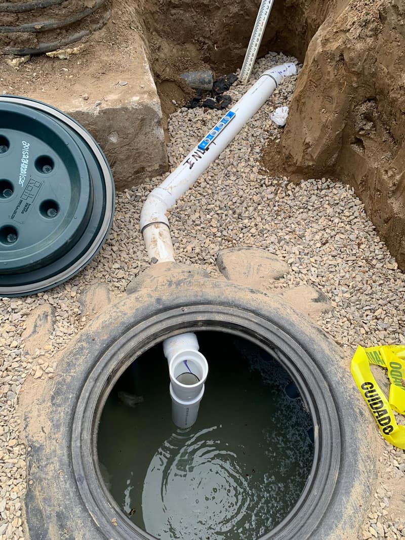 Open riser on a Roth tank showing the inlet pipe and the water level inside